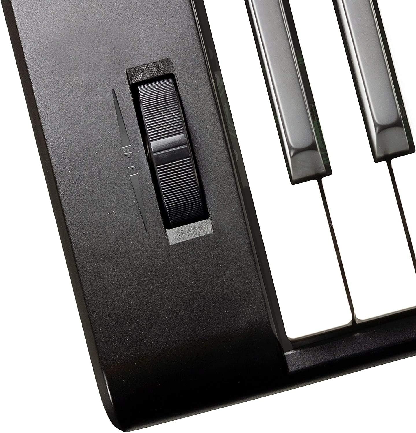 Close-up of 61-Key Keyboard Kit with volume control and piano keys for musicians