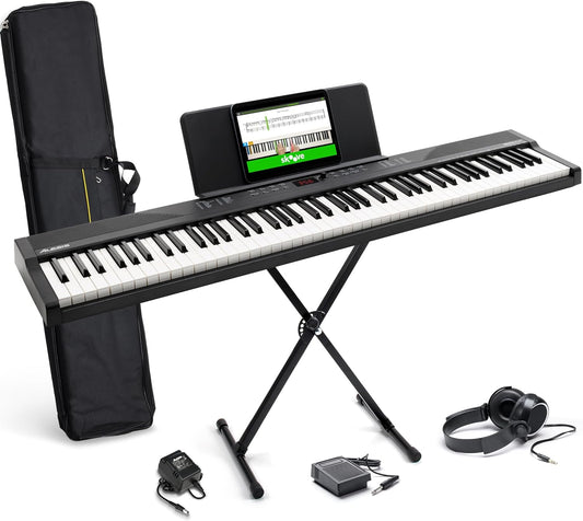 Alesis 88-key keyboard bundle with stand, headphones, pedal, and carrying case for musicians