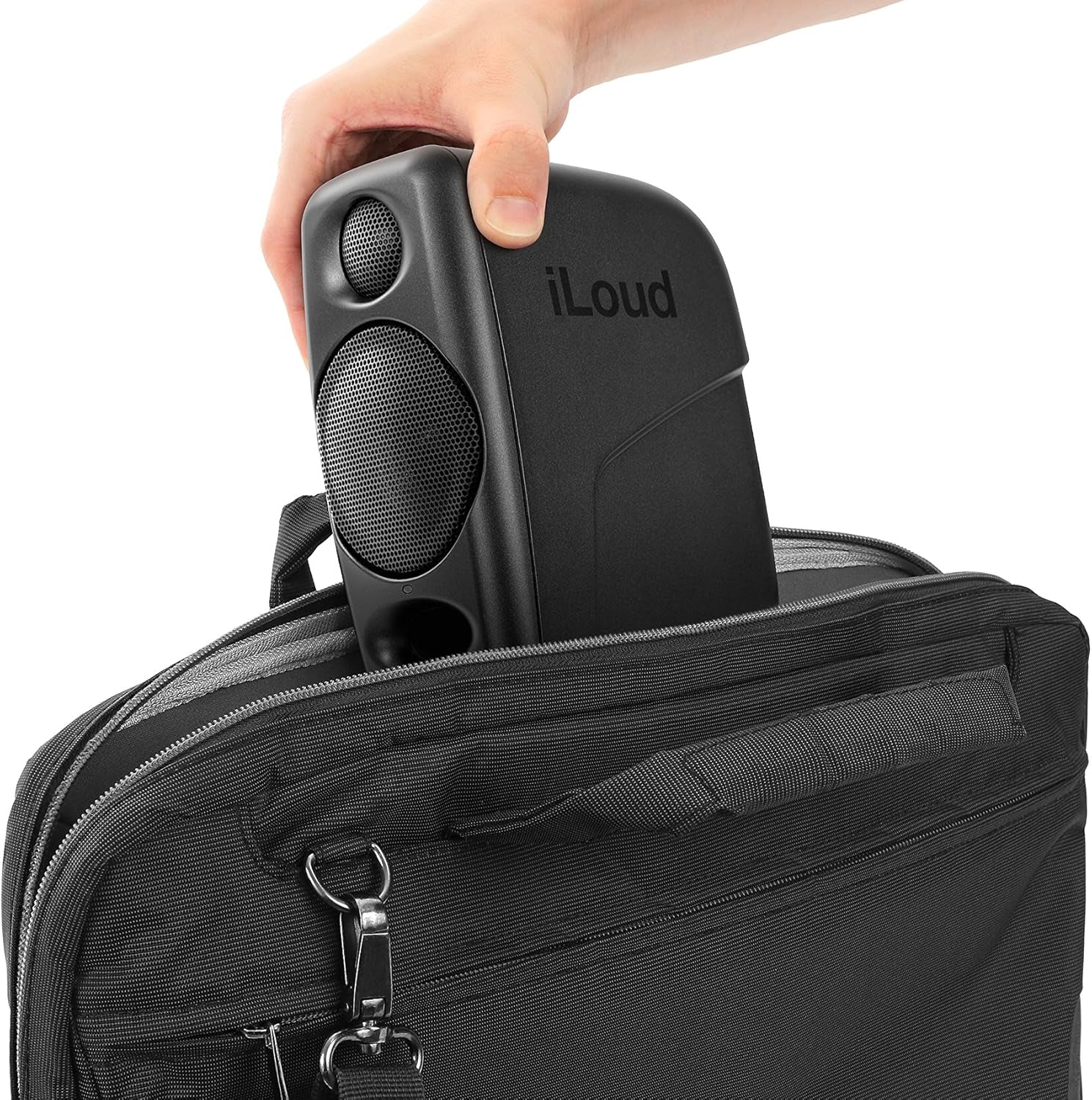 iLoud Micro Portable Speaker Being Placed in a Black Bag for Easy Transport